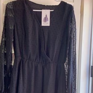 Flowy black dress with sheer sleeves